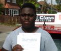 Michael with Driving test pass certificate